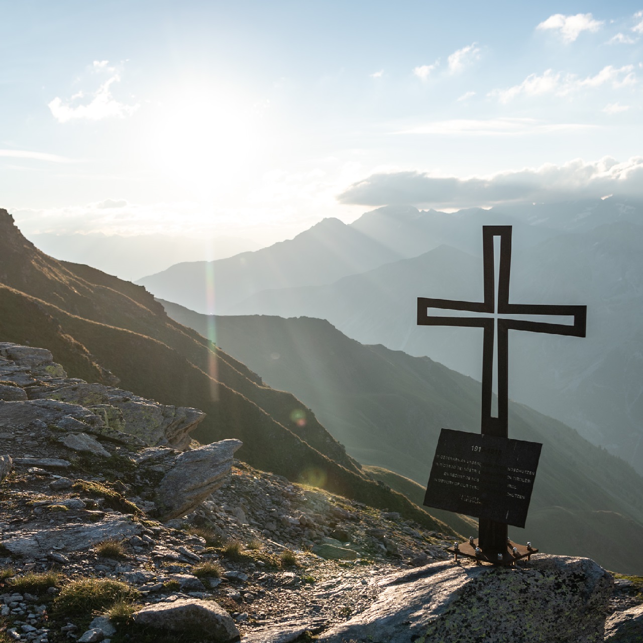 Cross on a mountain above Val Vanosta